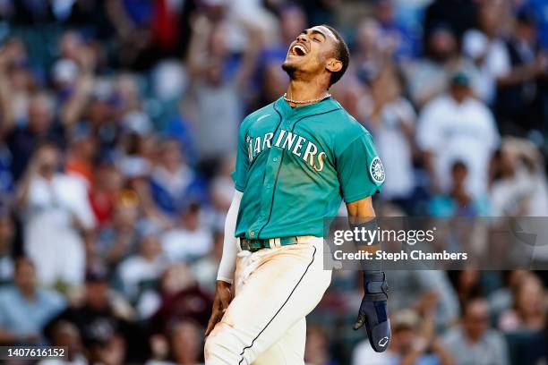 Julio Rodriguez of the Seattle Mariners scores a run during the third inning against the Toronto Blue Jays at T-Mobile Park on July 08, 2022 in...