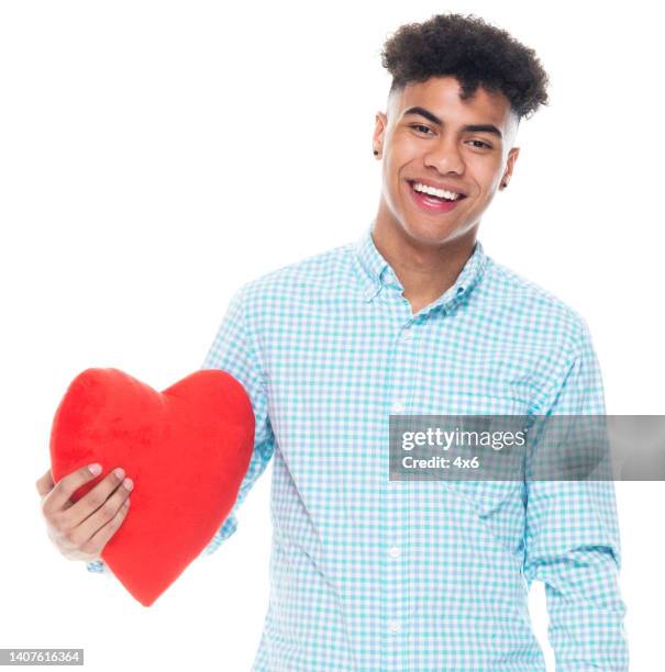 african ethnicity young male standing in front of white background wearing shirt - i love teen boys stock pictures, royalty-free photos & images