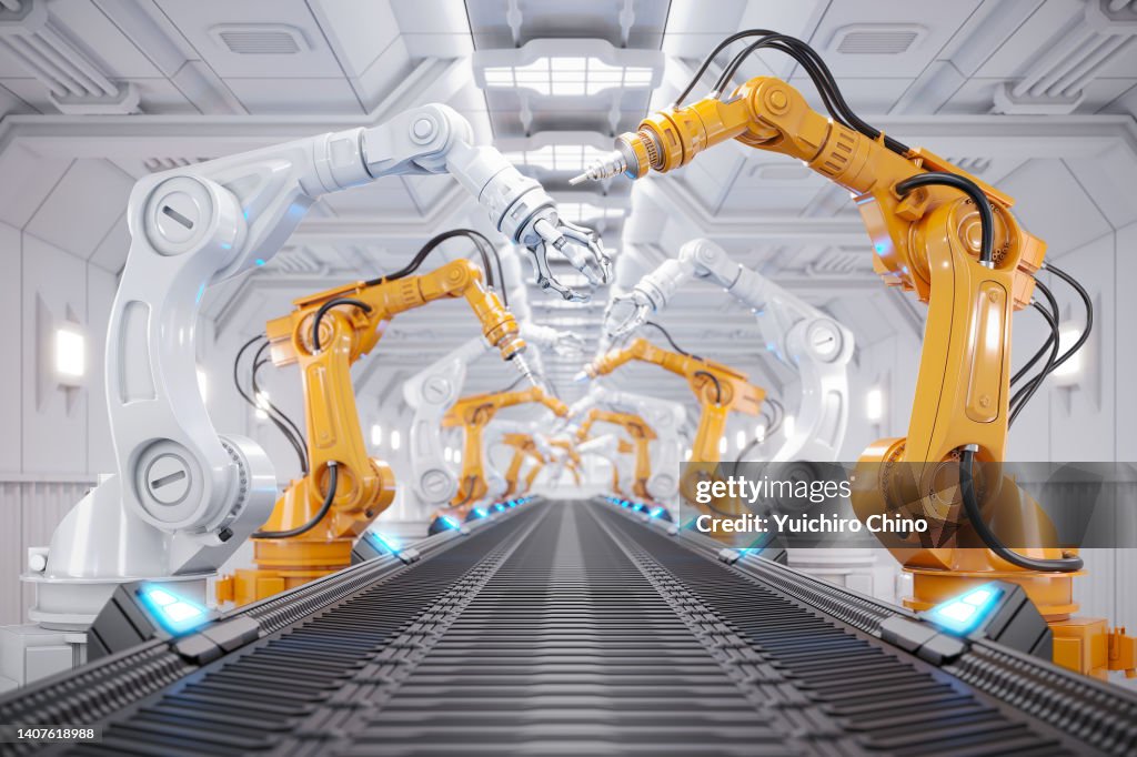 Robotic arm in futuristic assembly manufacturing factory
