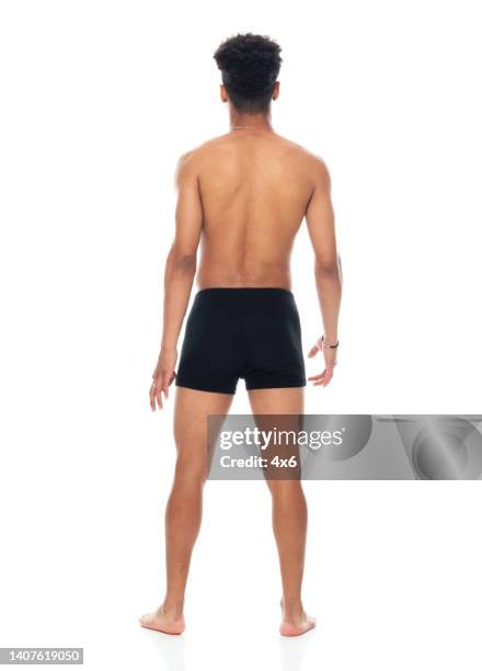 generation z teenage boys standing in front of white background wearing underwear - boys bare bum stock pictures, royalty-free photos & images