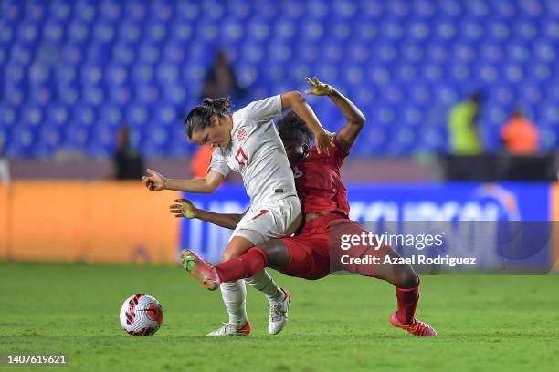 Jessie Fleming of Canada fights for the ball with Laurie Batista of Panama during the match between Panama and Canada as part of the 2022 Concacaf W...