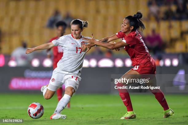 Jessie Fleming of Canada fights for the ball with Rebeca Espinosa of Panama during the match between Panama and Canada as part of the 2022 Concacaf W...