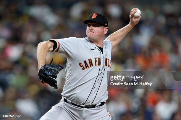 Jake McGee of the San Francisco Giants pitches during the eighth inning of a game against the San Diego Padres at PETCO Park on July 08, 2022 in San...