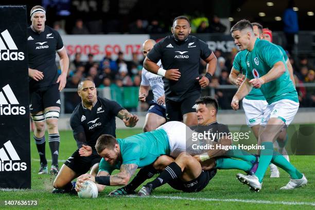 Andrew Porter of Ireland scores a try during the International Test match between the New Zealand All Blacks and Ireland at Forsyth Barr Stadium on...