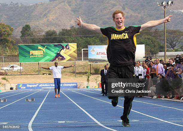 Prince Harry leaves Usain Bolt in his wake as he races him at the Usain Bolt Track at the University of the West Indies on March 6, 2012 in Kingston,...