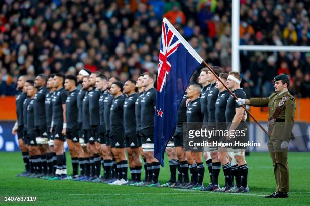 New Zealand line up for the national anthem during the International Test match between the New Zealand All Blacks and Ireland at Forsyth Barr...