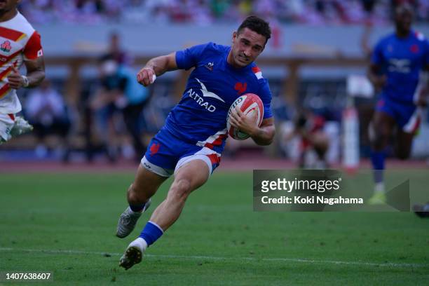 Baptiste Couilloud of France scores a try during the rugby international test match between Japan and France at the National Stadium on July 09, 2022...
