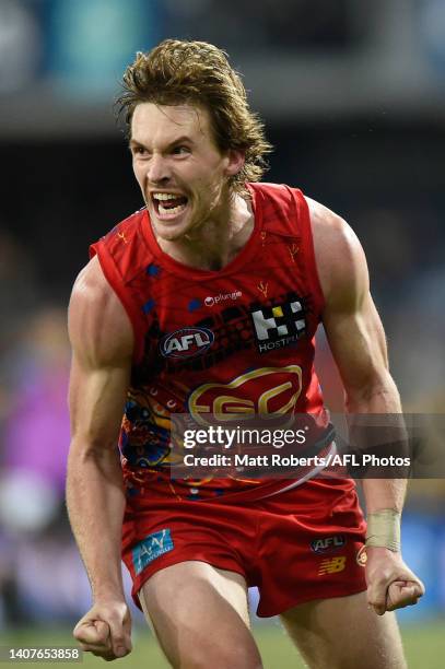 Noah Anderson of the Suns celebrates kicking a goal during the round 17 AFL match between the Gold Coast Suns and the Richmond Tigers at Metricon...