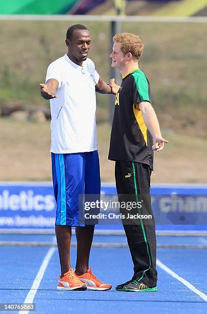 Prince Harry prepares to race Usain Bolt at the Usain Bolt Track at the University of the West Indies on March 6, 2012 in Kingston, Jamaica. Prince...