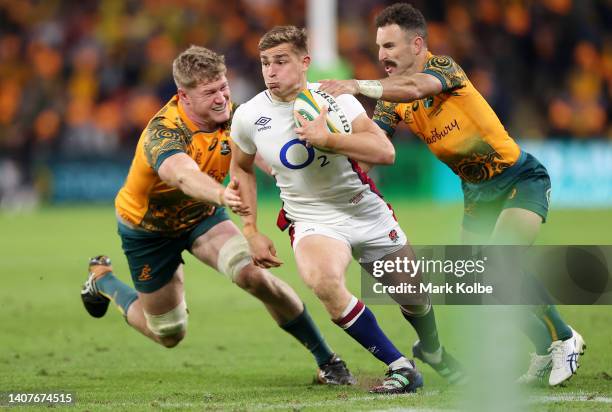 Jack van Poortvliet of England breaks past Nic White of Australia during game two of the International Test Match series between the Australia...