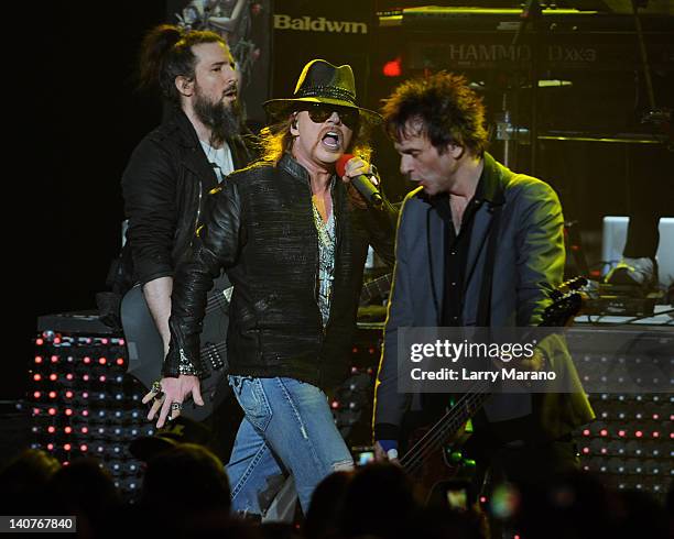 Ron "Bumblefoot" Thal, Axl Rose and Tommy Stinson of Guns N' Roses perform at Fillmore Miami Beach on March 5, 2012 in Miami Beach, Florida.