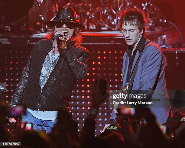 Axl Rose and Tommy Stinson of Guns N' Roses perform at Fillmore Miami Beach on March 5, 2012 in Miami Beach, Florida.