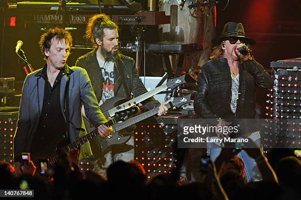 Tommy Stinson, Ron "Bumblefoot" Thal and Axl Rose of Guns N' Roses perform at Fillmore Miami Beach on March 5, 2012 in Miami Beach, Florida.