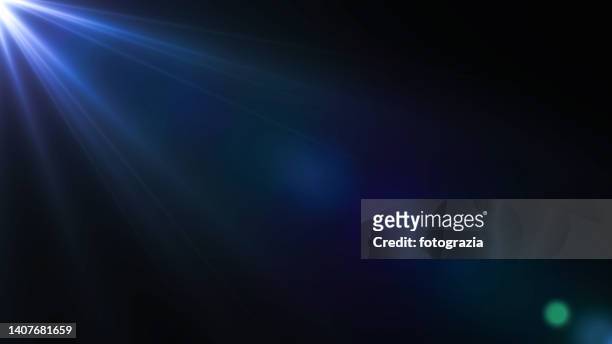 light and lens flare - light beams stock-fotos und bilder