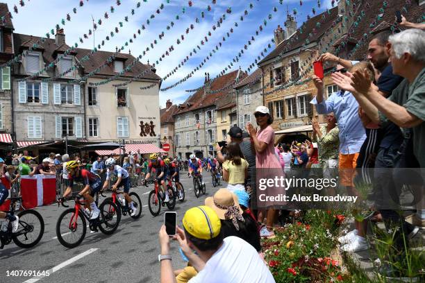 Thomas Pidcock of United Kingdom and Team INEOS Grenadiers - White Best Young Rider Jersey and a general view of the Peloton passing through Arbois...