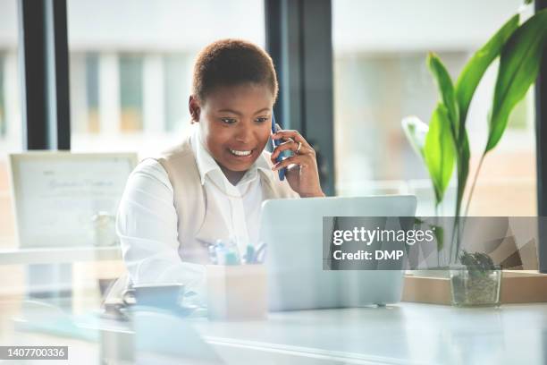 businesswoman using a phone and laptop while on a call in an office speaking to clients and scheduling a meeting. hr lady conducting an interview via an online app, typing on a wireless computer - bingo caller stock pictures, royalty-free photos & images