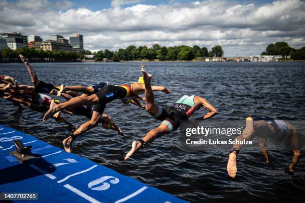 Athletes perform in the swim leg during the ITU World Triathlon Elite men sprint race on July 9, 2022 in Hamburg, Germany.