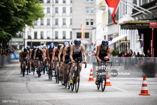 Athletes perform in the bike leg during the ITU World Triathlon Elite men sprint race on July 9, 2022 in Hamburg, Germany.