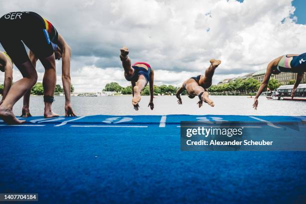 Athletes perform in the swim leg of the Age Group during the Hamburg Wasser World Triathlon on July 9, 2022 in Hamburg, Germany.