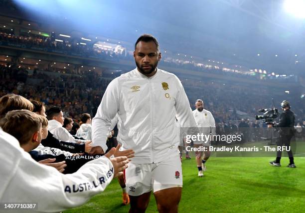 Billy Vunipola of England greets fans as he runs onto the field of play before game two of the International Test Match series between the Australia...
