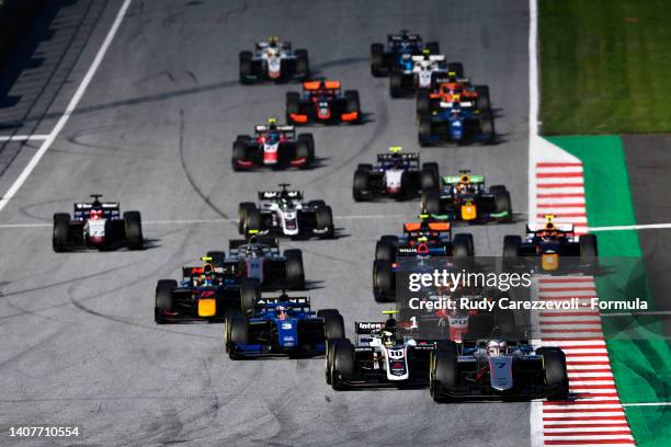 Marcus Armstrong of New Zealand and Hitech Grand Prix leads the field into turn one at the start during the Round 8:Spielberg Sprint race of the...