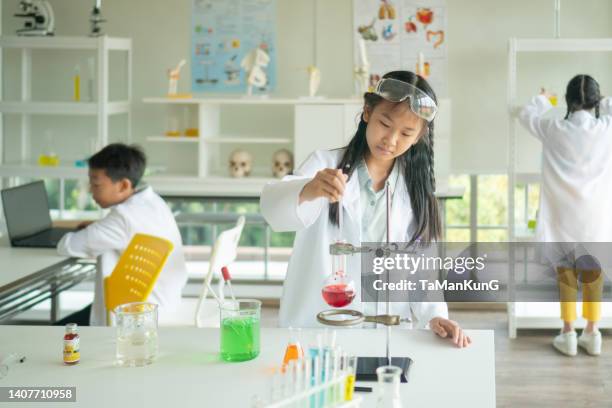 childhood students and friends learning science in classroom lab - genetic screening stock pictures, royalty-free photos & images