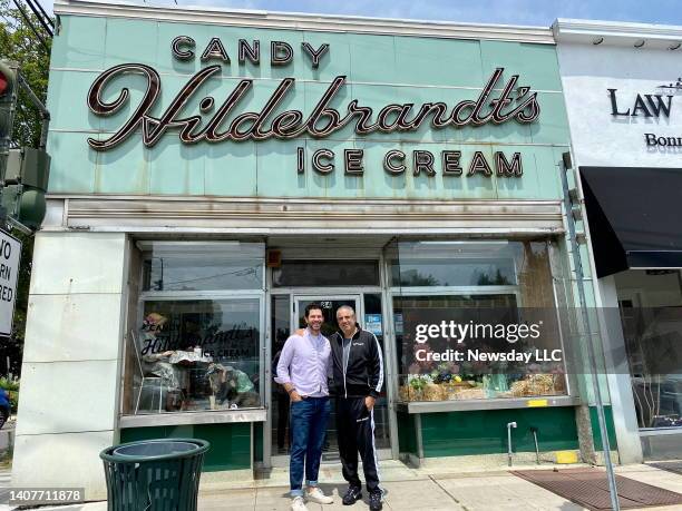 Spencer Singer, left, and Randy Sarf are the new owners of Hildebrandt's, a century-old ice cream parlor in Williston Park, New York, July 8, 2022.