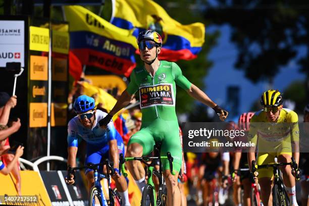 Wout Van Aert of Belgium and Team Jumbo - Visma - Green Points Jersey celebrates at finish line as stage winner ahead of Michael Matthews of...