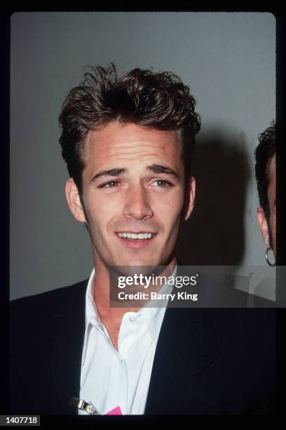 Luke Perry attends the first annual MTV Movie Awards June 6, 1992 in Los Angeles, CA. The show combined performances with award presentations and...