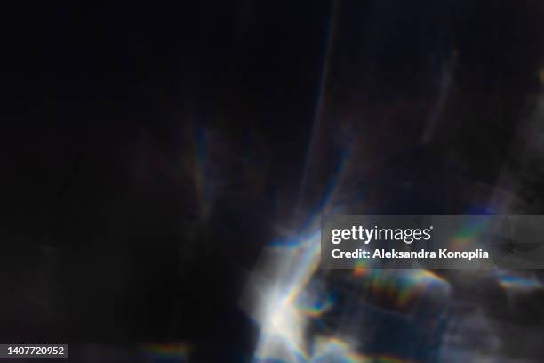 colourful rainbow light leaks texture on black background - distress flare stock pictures, royalty-free photos & images