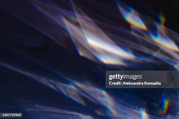 colourful rainbow light leaks texture on black background - distress flare stock pictures, royalty-free photos & images