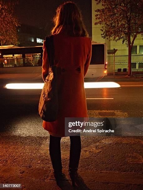 woman waiting for the bus - bucharest photos stock pictures, royalty-free photos & images