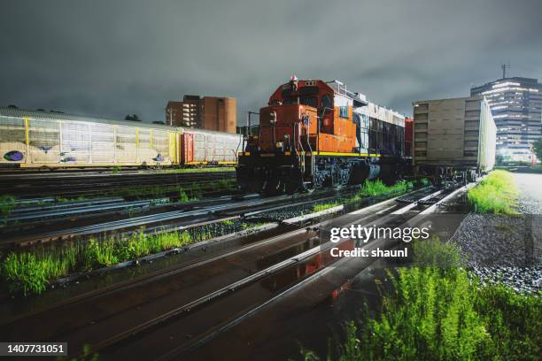 railyard at night - train yard at night stock pictures, royalty-free photos & images