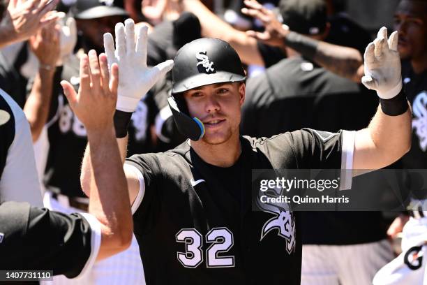 Gavin Sheets of the Chicago White Sox celebrates in the dugout with teammates after his three run home run in the first inning against the Detroit...