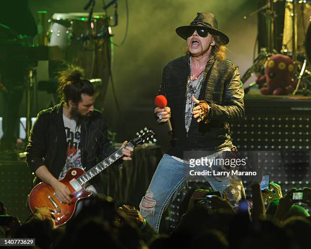 Ron "Bumblefoot" Thal and Axl Rose of Guns N' Roses perform at Fillmore Miami Beach on March 5, 2012 in Miami Beach, Florida.