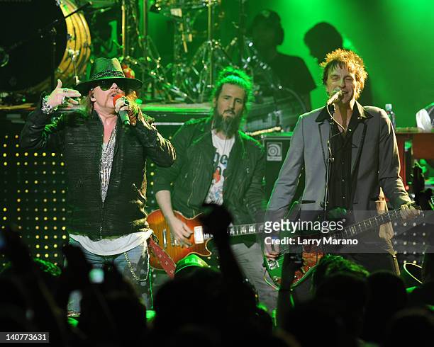 Ron "Bumblefoot" Thal, Axl Rose and Tommy Stinson of Guns N' Roses perform at Fillmore Miami Beach on March 5, 2012 in Miami Beach, Florida.