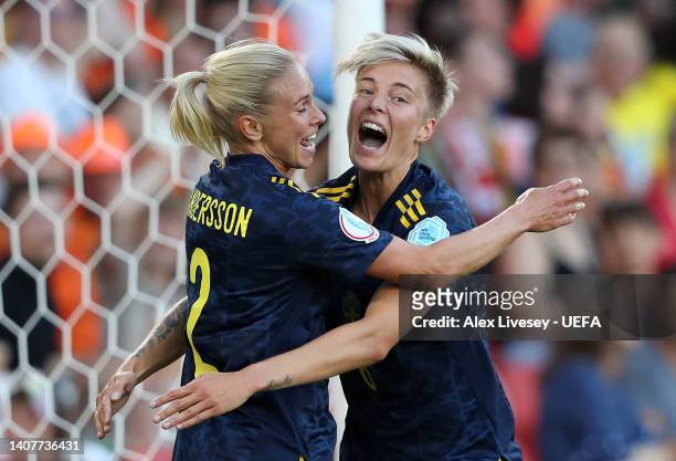 Jonna Andersson celebrates with Lina Hurtig of Sweden after scoring their team's first goal during the UEFA Women's Euro 2022 group C match between...