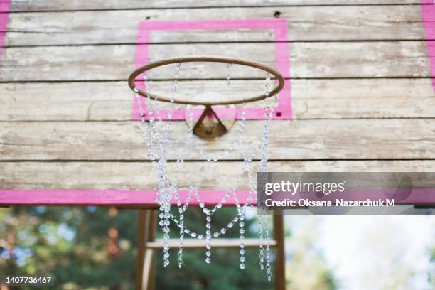 basketball hoop with crystal decoration - crystal ball stock-fotos und bilder