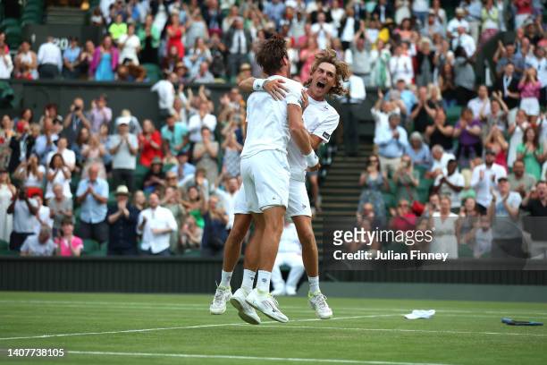 Matthew Ebden of Australia and partner Max Purcell of Australia celebrate after winning match point against Nikola Mektic of Croatia and Mate Pavic...