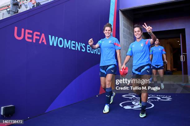 Valentina Bergamaschi and Flaminia Simonetti of Italy enter the pitch to warm up during the UEFA Women's Euro 2022 Italy Press Conference And...