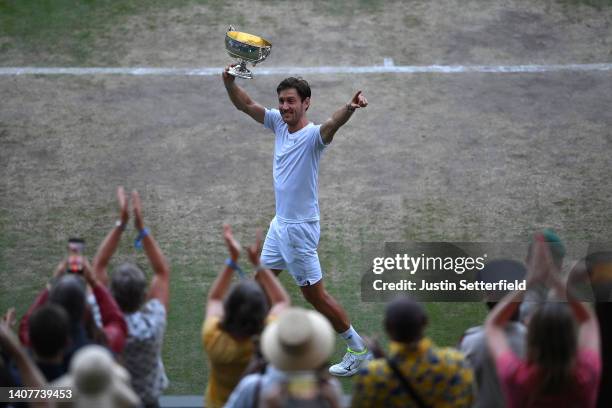 Matthew Ebden of Australia and partner Max Purcell of Australia celebrate with the winners trophies after winning match point against Nikola Mektic...