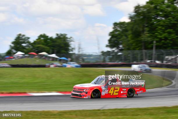 Carson Hocevar, driver of the Premier Security Solutions Chevrolet, drives during the NASCAR Camping World Truck Series O'Reilly Auto Parts 150 at...