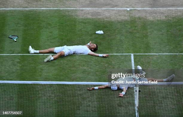 Matthew Ebden of Australia and partner Max Purcell of Australia celebrate after winning match point against Nikola Mektic of Croatia and Mate Pavic...