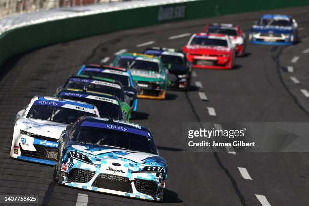 Ryan Truex, driver of the Auto-Owners Insurance Toyota, leads the field during the NASCAR Xfinity Series Alsco Uniforms 250 at Atlanta Motor Speedway...