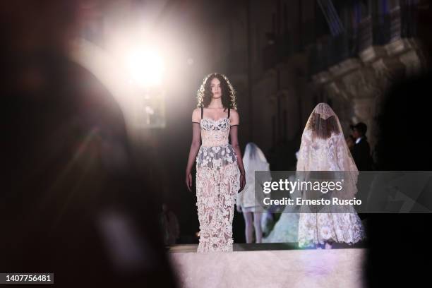 Deva Cassel walks the runway at the Dolce & Gabbana haute couture fall/winter 22/23 event on July 09, 2022 in Siracusa, Italy.