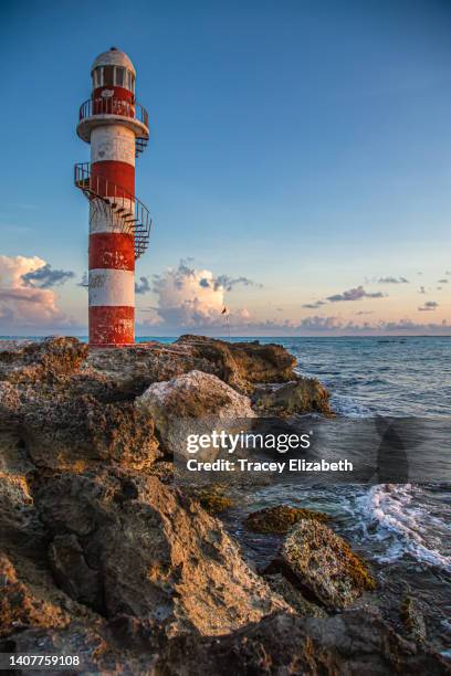 sunrise at the cancun lighthouse - lighthouse reef stock pictures, royalty-free photos & images