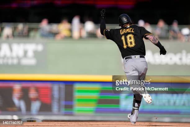 Ben Gamel of the Pittsburgh Pirates celebrates as he runs the bases after hitting a two-run home run in the seventh inning against the Milwaukee...