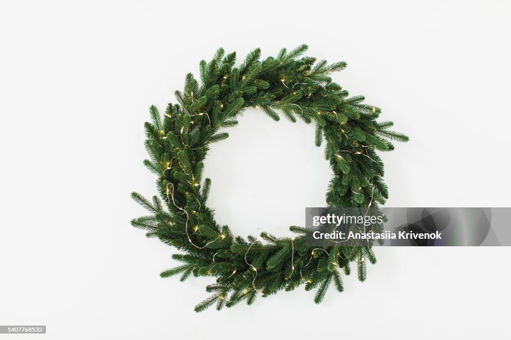 Christmas wreath against white background.