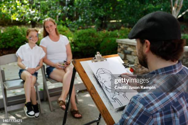 Caricature artist and guests seen during Got Your 6 VetFest hosted by The Bob Woodruff Foundation at The Loveless Barn on July 09, 2022 in Nashville,...