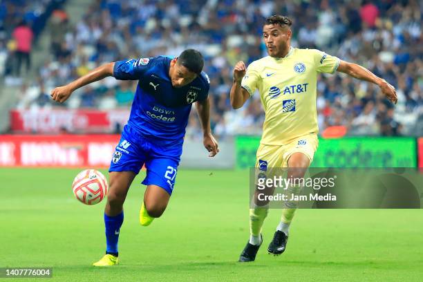 Luis Romo of Monterrey fights for the ball with Jonathan Dos Santos of America during the 2nd round match between Monterrey and America as part of...